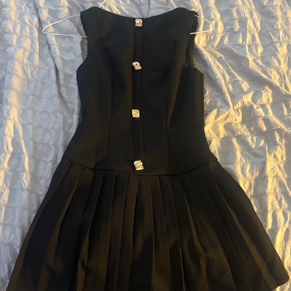 Elegant Black Pleated Dress with Button Accents